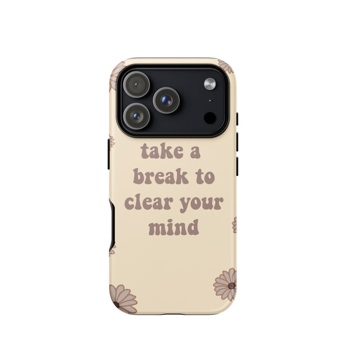 Phone case with 'take a break to clear your mind' text and floral design on beige background