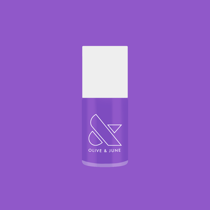 Bottle of Tennis Skirt nail polish by Olive and June in bright purple for quick-dry, long-lasting at-home mani looks