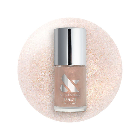 The Golden Effect Top Coat bottle with shimmering golden polish on a glossy swatch for radiant manicures