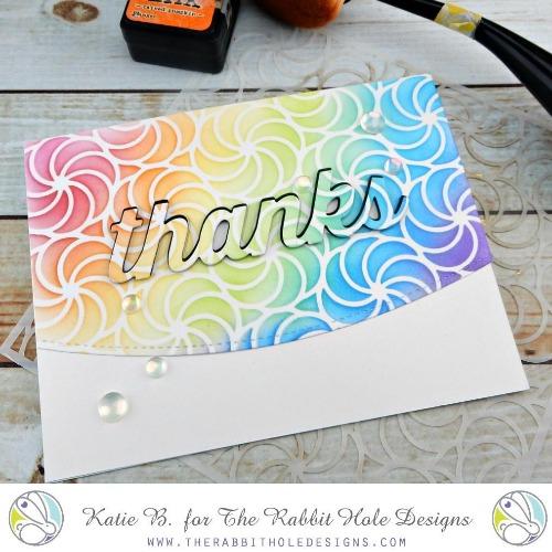 The Rabbit Hole Designs - 6x6 Stencil - Candy Twist. The Rabbit Hole Designs is proud to bring you our Made in the U.S.A 6x6 Stencils that will soon become an essential in your paper crafting and mixed media projects. You can paint, spray, mist, spritz, airbrush, sponge, doodle, mask, and so more!  Available at Embellish Away located in Bowmanville Ontario Canada. Card design by Katie B.