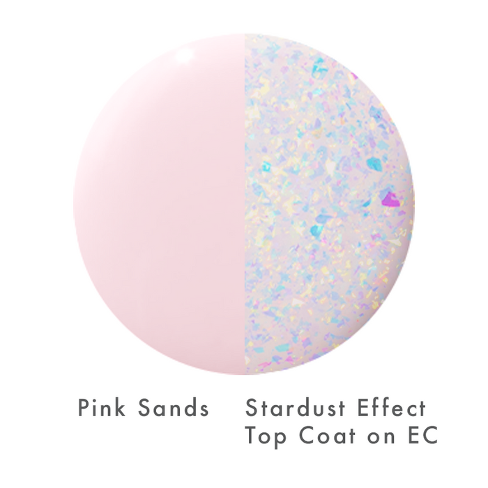 The Stardust Effect Top Coat layered over a soft pink base showing holographic flake sparkle for a luminous mani finish