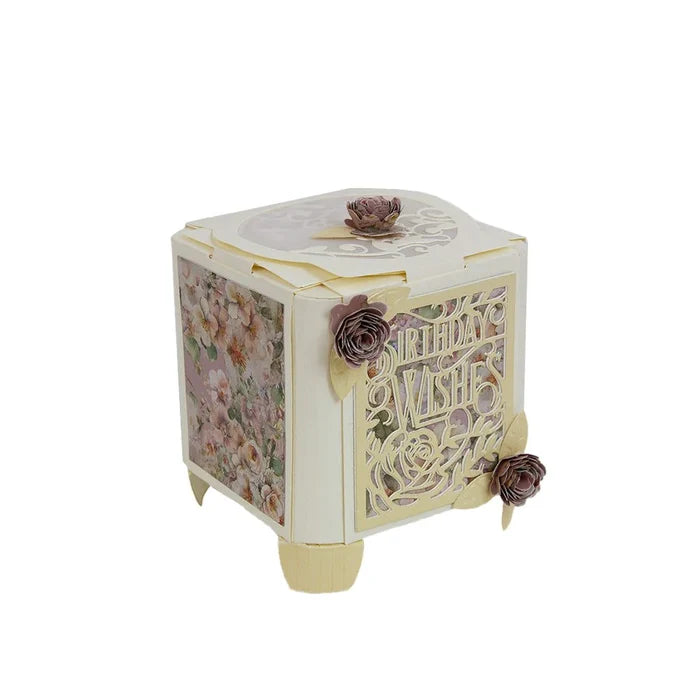 Tonic Studios - Die Set - Amazing Aperture Box. Craft sensational boxes, memory books, interactive cards and more with the Dimensions range of three-dimensional dies! Available at Embellish Away located in Bowmanville Ontario Canada. Example by brand ambassador.