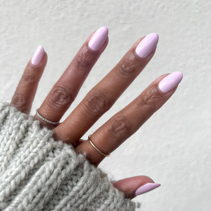 wait does it come in pink? showing a smooth baby pink gel polish manicure on natural nails with a long-lasting finish