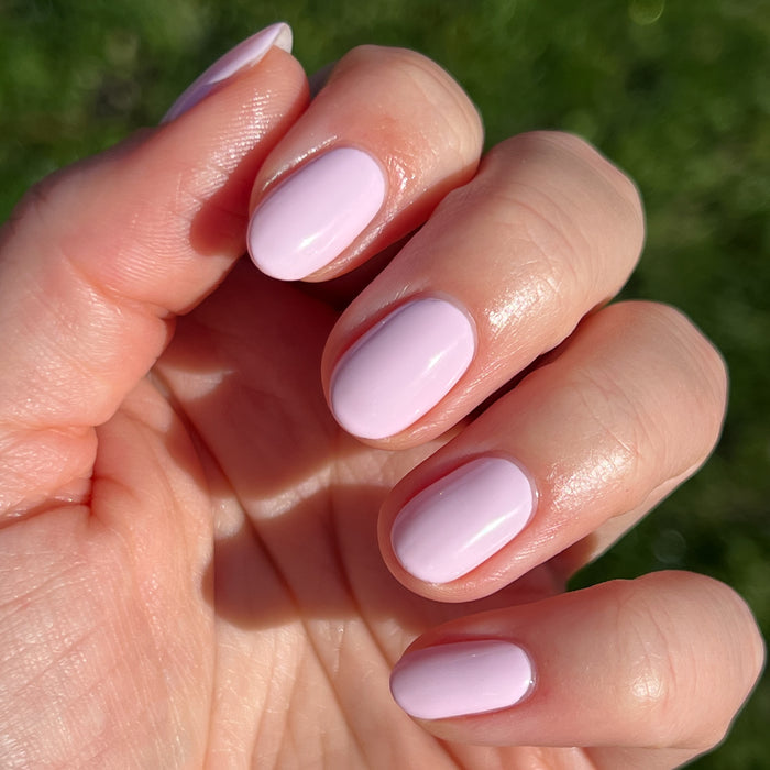 wait does it come in pink? showing smooth baby pink gel polish manicure with a shiny, long-lasting finish on natural nails