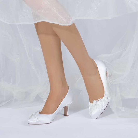 S&DCo. elegant white wedding shoes for bride low heel with floral embellishments for a classic look