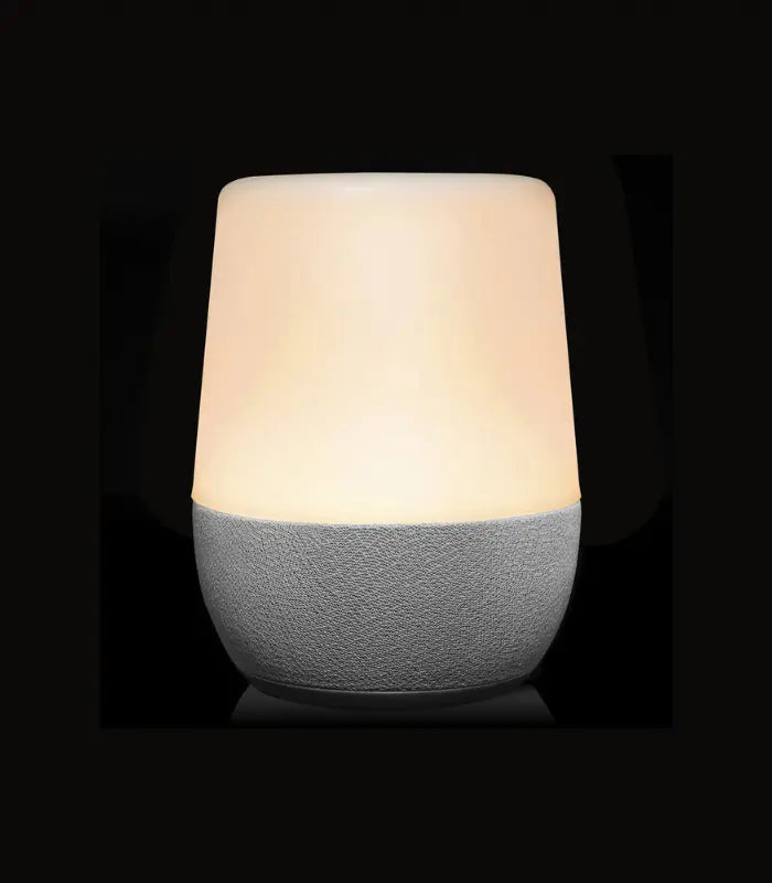 Yogasleep Duet Bluetooth White Noise Machine with calming night light, perfect for improving sleep and relaxation routines